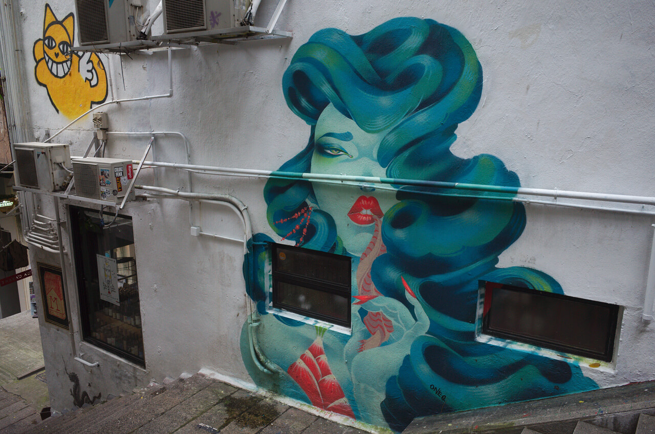 Street art par Oneq à Hong Kong